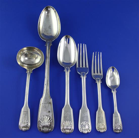 A part suite of late William IV/early Victorian silver double struck, fiddle, thread and shell pattern flatware, 123.5 oz.